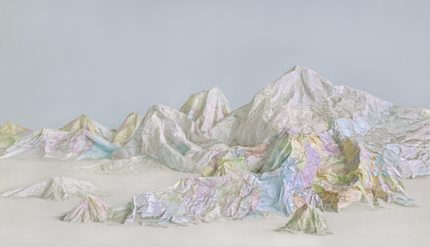 mentalflossr:This Artist Turns Recycled Maps Into Mountains