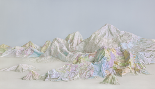 mentalflossr:This Artist Turns Recycled Maps Into Mountains