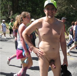 nakeddanh: At my first Bay to Breakers in 2009, I spotted a young lady taking my photograph.  So I stopped and posed for her.  I then invited her to pose with me while her companion took a photo with her camera, and I was lucky enough later to find