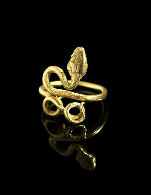 Roman-Egyptian gold ring in the form of a snake, c. 1st-2nd centuries CE. From Bonhams auction house
