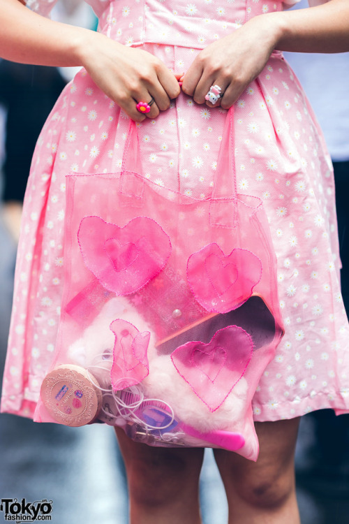 Japanese twins Ayane and Suzune wearing kawaii street styles on a rainy day in Harajuku with handmad