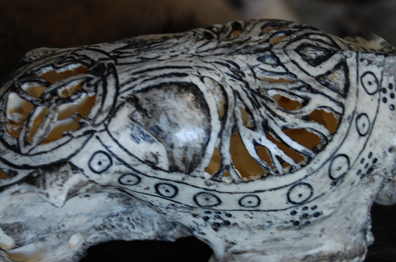 magicallycapricious:  Carved black bear skull. Tree of life and a triquetra.  Available