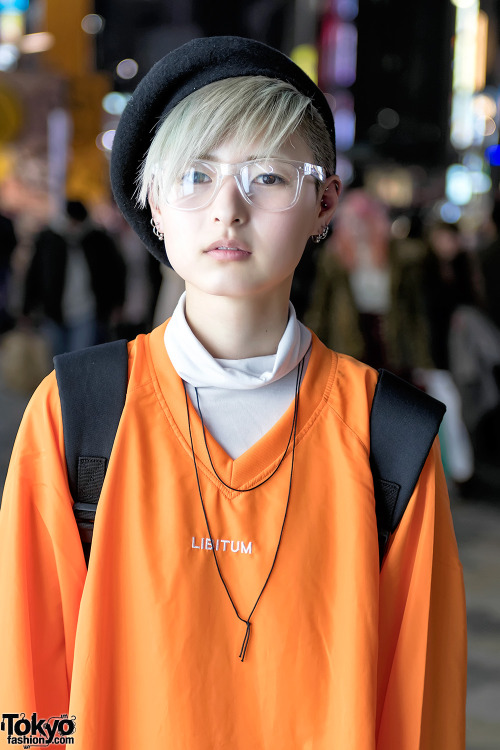 Pyon on the street in Harajuku wearing an extra long sleeve top from LIBITUM ad LIB with ripped MYOB