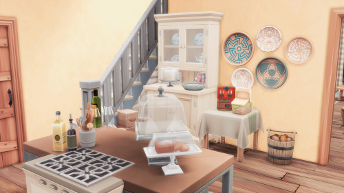 I made a new save. This is my sim Mariella’s house. 