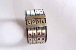 wickedclothes:  A Ring With Rolling Letters The perfect gift to serve as a reminder of your eternal commitment to each other: as best friends, lovers, or both. Playful, modernistic and simple. This unique band could write words like: love, kiss, ever,
