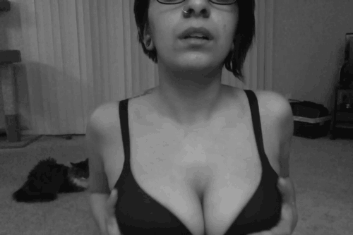 satanssweetheart:  Here’s me being “sexy” in front of my cat… Look at the