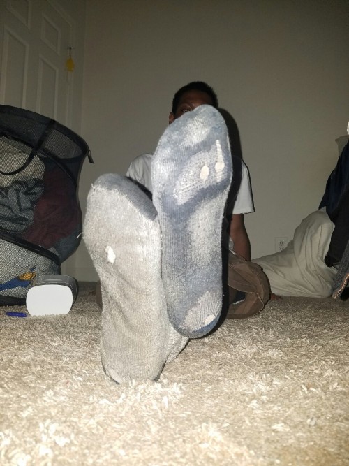 Random assortment of my smelly socks, and barefeet. Even get to see a gift of a guy enjoying my sock
