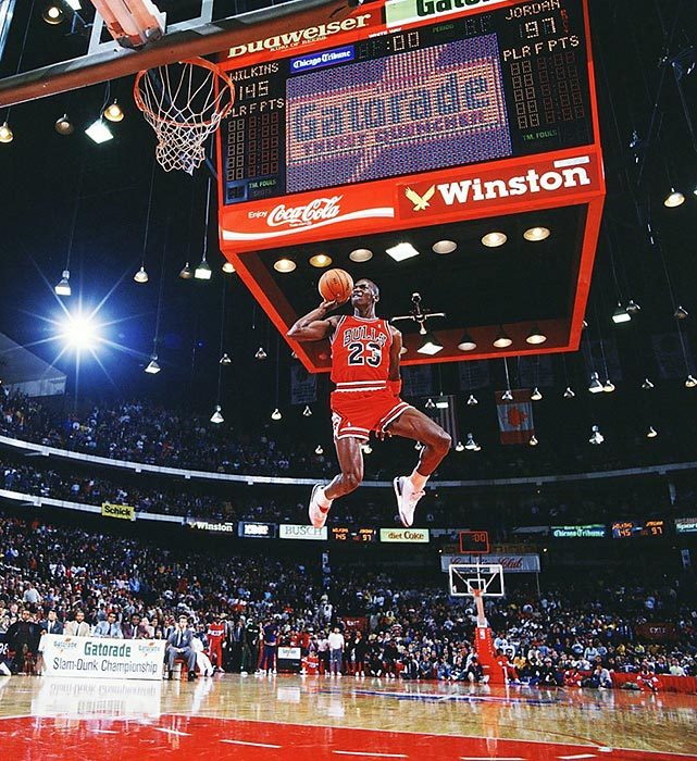 siphotos:  Michael Jordan leaps from the free-throw line for a perfect-score dunk
