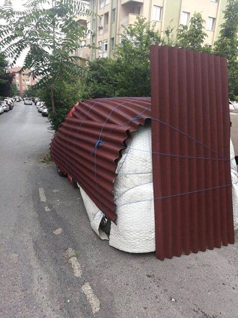 People prepare for a hailstorm in Istanbul, Turkey. Interesting way to prep you car