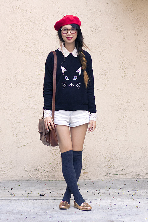 Navy blue otk socks with shiny copper toned flat shoes and white denim shorts