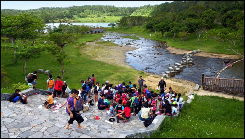 KIDS PACKING UP TO GO BACK TO SCHOOL AFTER A GOOD SWIM IN THE FRESH-WATER POOL AND CHILDREN&rsquo;S 