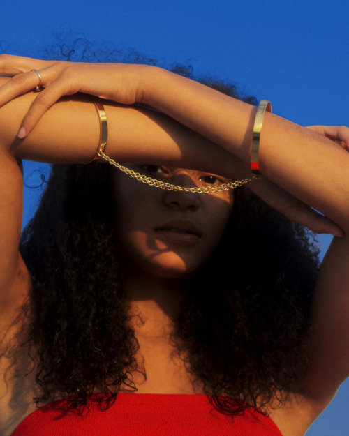 FREEDOM IN RESTRAINT. Handcuff bangles worn by Searcy Kwon, shot by Kelia Anne