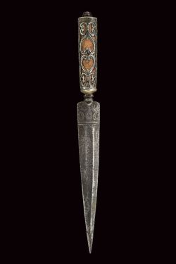 art-of-swords:  European Dagger Dated: first quarter of the 19th century Culture: Italian Measurements: overall length 29.5 cm The dagger has a straight, double-edged blade with floral engravings at the centre and at the tang, a white metallic ring-nut