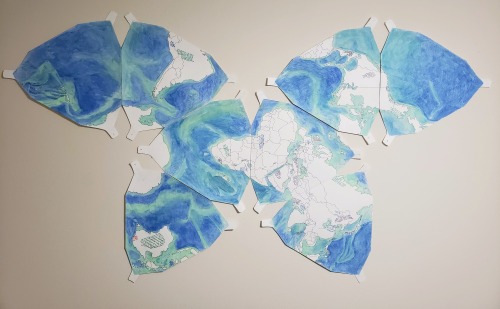 Rearrangeable ink and watercolor Waterman Butterfly map of the world.Ocean has topography (and, one 