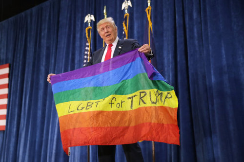 cardinalprince:huffpostqueervoices:Trump Bizarrely Displays Rainbow Flag Declaring ‘LGBT For Trump’ 