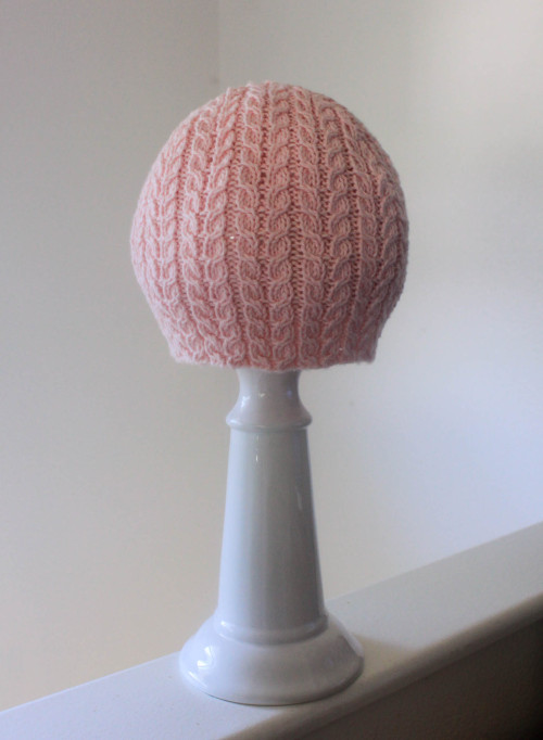 [ strawberry scoop hat by gingerhaole on etsy ]I’ve been knitting a lot, even if I haven’t been post