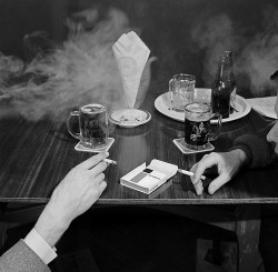 n-o-i-r-w-h-i-t-e:   Two men smoking cigarettes