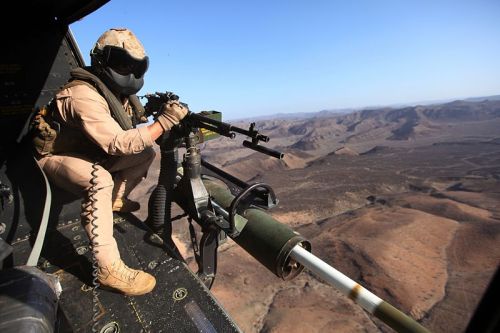 flytofight:  A teenage mutant ninja turtle UH-1Y Venom aircrew watches a 2.75 inch rocket come off the rails during a live fire exercise.   