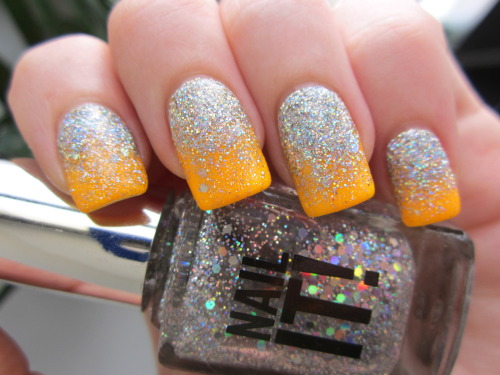 Glitter gradient with China Glaze Sun Worshipper, plus loose glitter and a variety of holographic gl