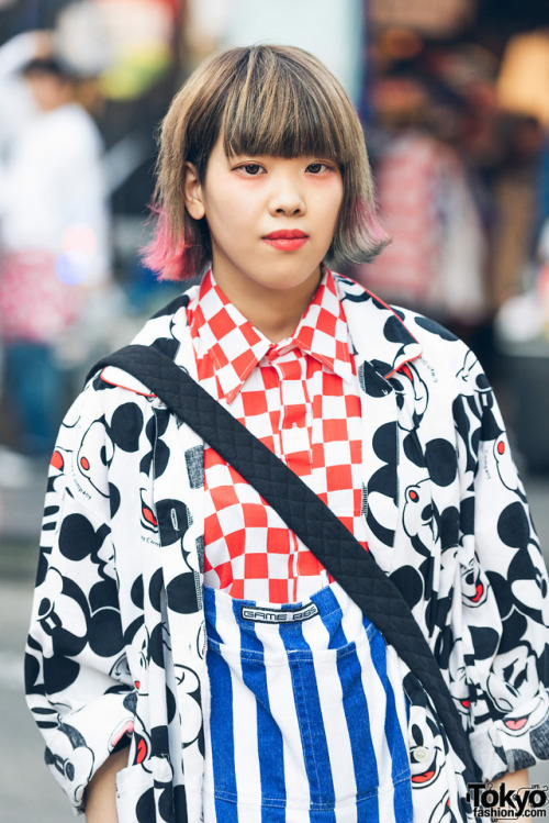 21-year-old Pujiwara on the street in Harajuku wearing a vintage/resale look with Mickey Mouse all o
