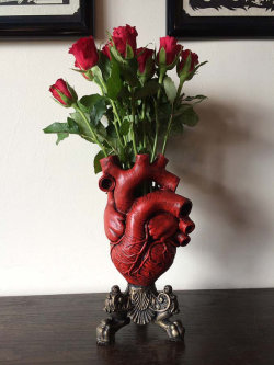 wickedclothes:  These vases are sculptures of an anatomical human heart, cast in resin and hand-painted. Each measures 10.5&quot; tall. As you can imagine, they can be rather expensive – but we’re giving one away for free! Winner has their choice