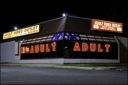 charmcityking:  patgavin:  Friday night in East Baltimore, Pulaski Highway area. While taking the photo of the Duke Motel the manager came out and told me I couldn’t take photos here because it was private property. I asked her a few questions about