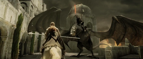Gandalf faces a flying creature with a dark armored figure on its back