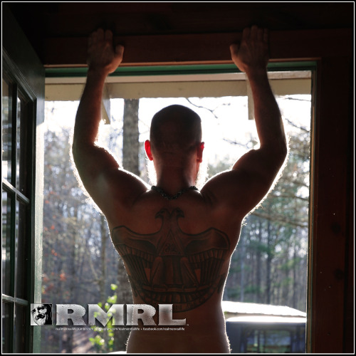 Josh, lit up and outlined by the sunlight streaming into the cabin doorway. ✨