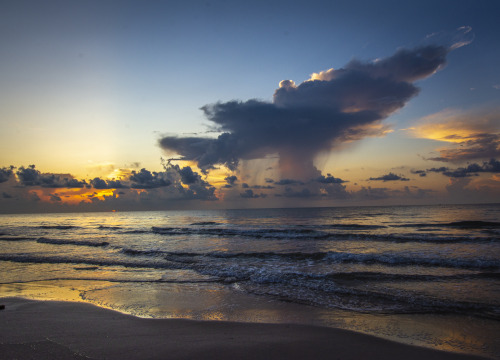 lawrencejeffersonphotography:Sunrise and a storm cloud over the Texas Gulf Coast!