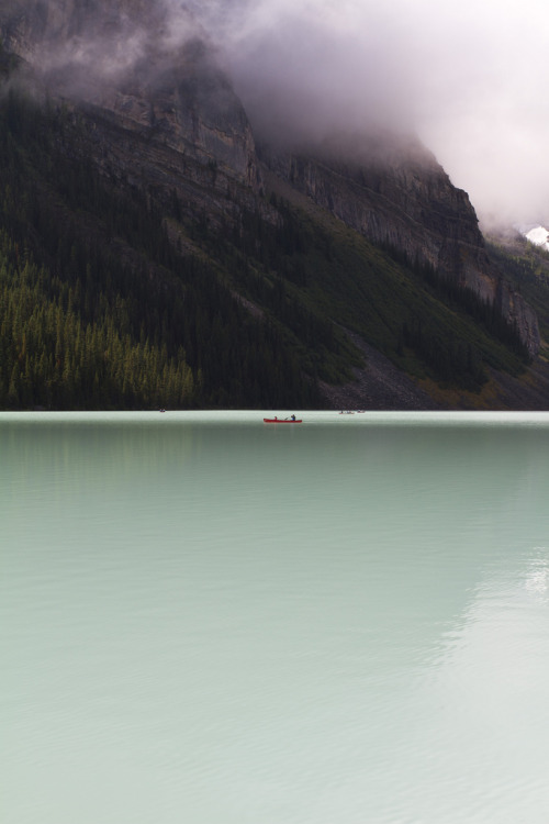 99lions:  Natures Simplicity  The moving glacial ice constantly grinds away the Lake Louise bedrock creating silt that causes this beautiful emerald colour.  