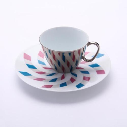thegoblinmarketofficial:  steampunkworldsfair:  Mirror Teacups and Saucers by D-Bro The cups are mirrored to reflect the colorful artwork displayed on the saucers. Here are more examples: [Source]  We would prefer something considerably less…. bright