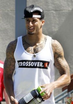 iheart49ersfootball:  I don’t always agree with Colin’s fashion choices but when he wears these tank tops I lose all focus haha. It kills me that he is this sexy… 