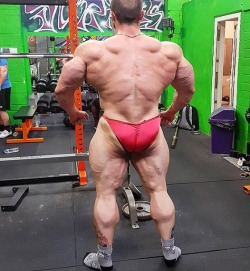 needsize:  Stressed posers holding this guys big roid ass. Woof!