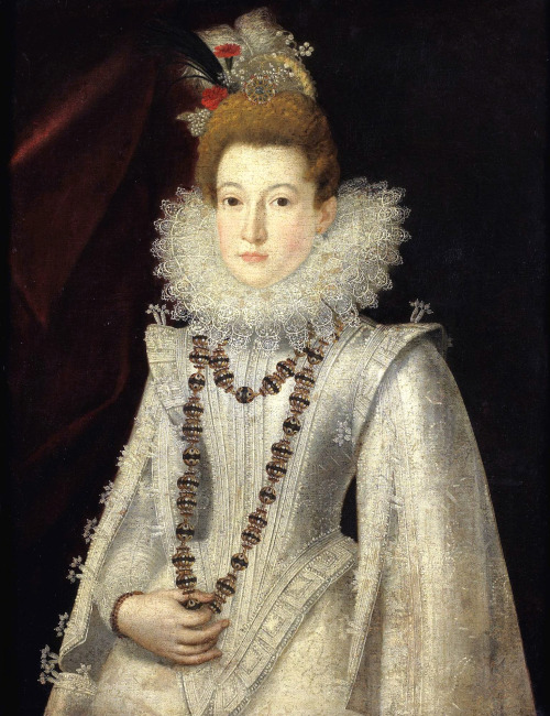 Portrait of a lady, half length, wearing a white richly embroidered dress and holding a necklace. Fo