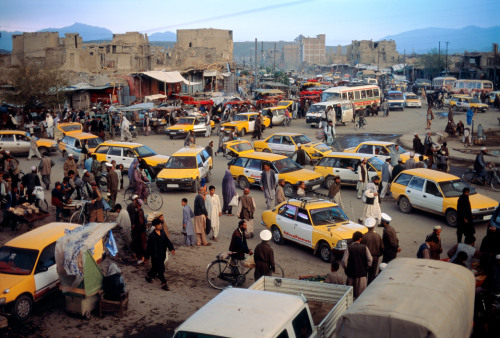 20aliens:AFGHANISTAN. Kabul. 2002. Taxis wait in Kabul’s bustling bazaars.By Steve McCurry