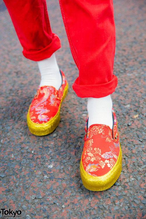 Weni on the street in Harajuku wearing a red outfit with Vans x Opening Ceremony Qi Pao sneakers, a 