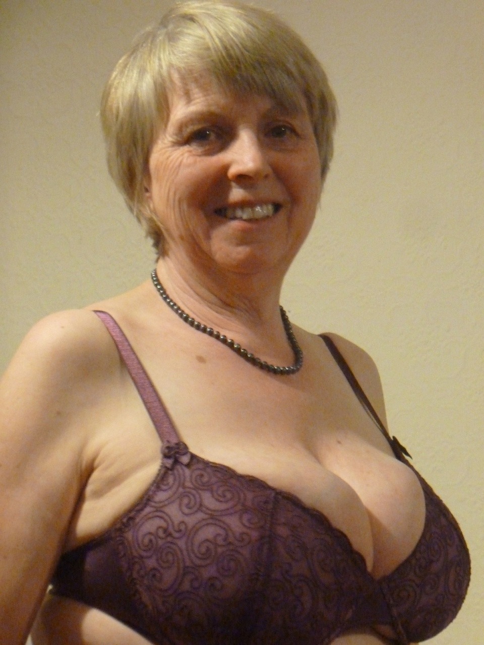 Gorgeous sexy granny with a bra full of succulent breast!Find your sexy senior partner