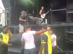 blnik182:jenna mcdougall protecting a fan from security at brisbane soundwave x