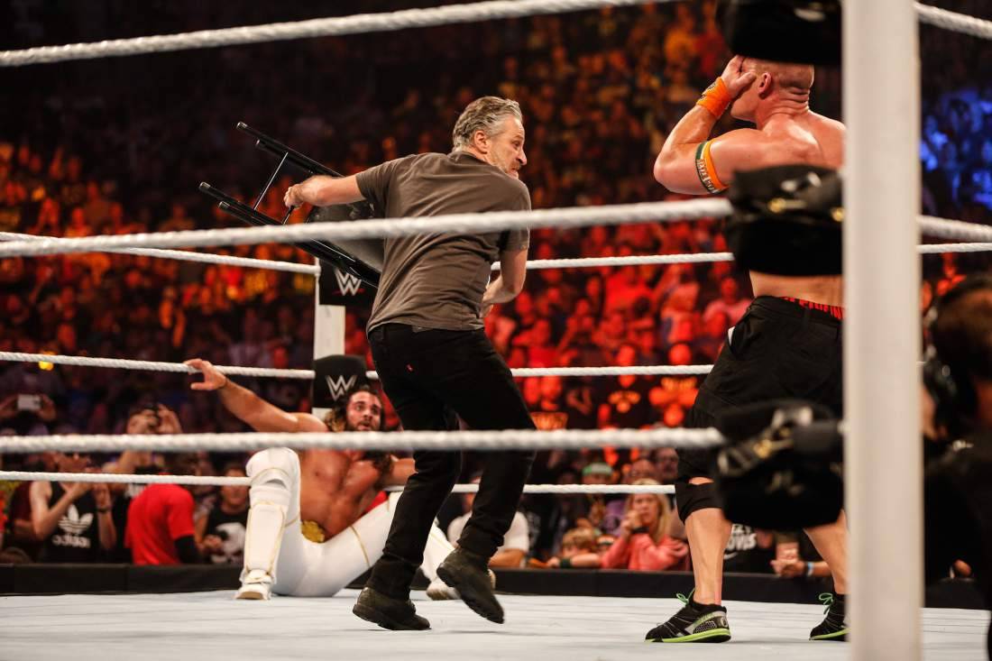 Watch Jon Stewart Whack WWE’s Cena With A ChairJon Stewart relinquished his seat on ‘The Daily Show,’ but he put a chair to good use at WWE SummerSlam and beat the crap out of some wrestlers.