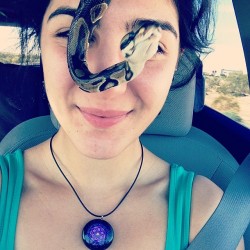 embrace-your-earth:  Her favorite spot…on my head, front and center towards the camera 🙆🐍📷 