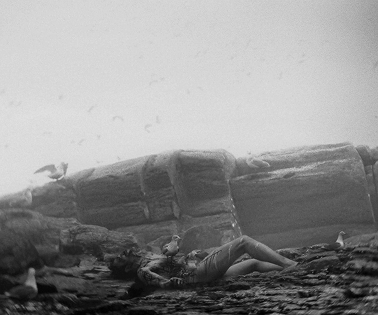 movie-gifs: Should pale death, with treble dread, make the ocean caves our bed, God who hears the surges roll, deign to save our suppliant soul. THE LIGHTHOUSE (2019) dir. Robert Eggers 