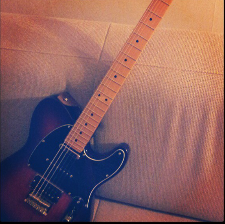 guitar-porn:  1981 Washburn D12, Homemade 3-string Cigarbox guitar, Epiphone Les Paul and a Fender Modern Player Telecaster. Thanks to David L for sending in these evocative shots of a select few of his guitar collection! 