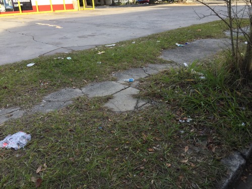 barefootafterdark:Empty bottles of cheap liquor. Condom wrappers. Empty cigarette packets. Trash. Unkempt parking lots of equally unkempt convenience stores. Welcome to the Savannah, Georgia that you don’t see in the tourist pamphlets.