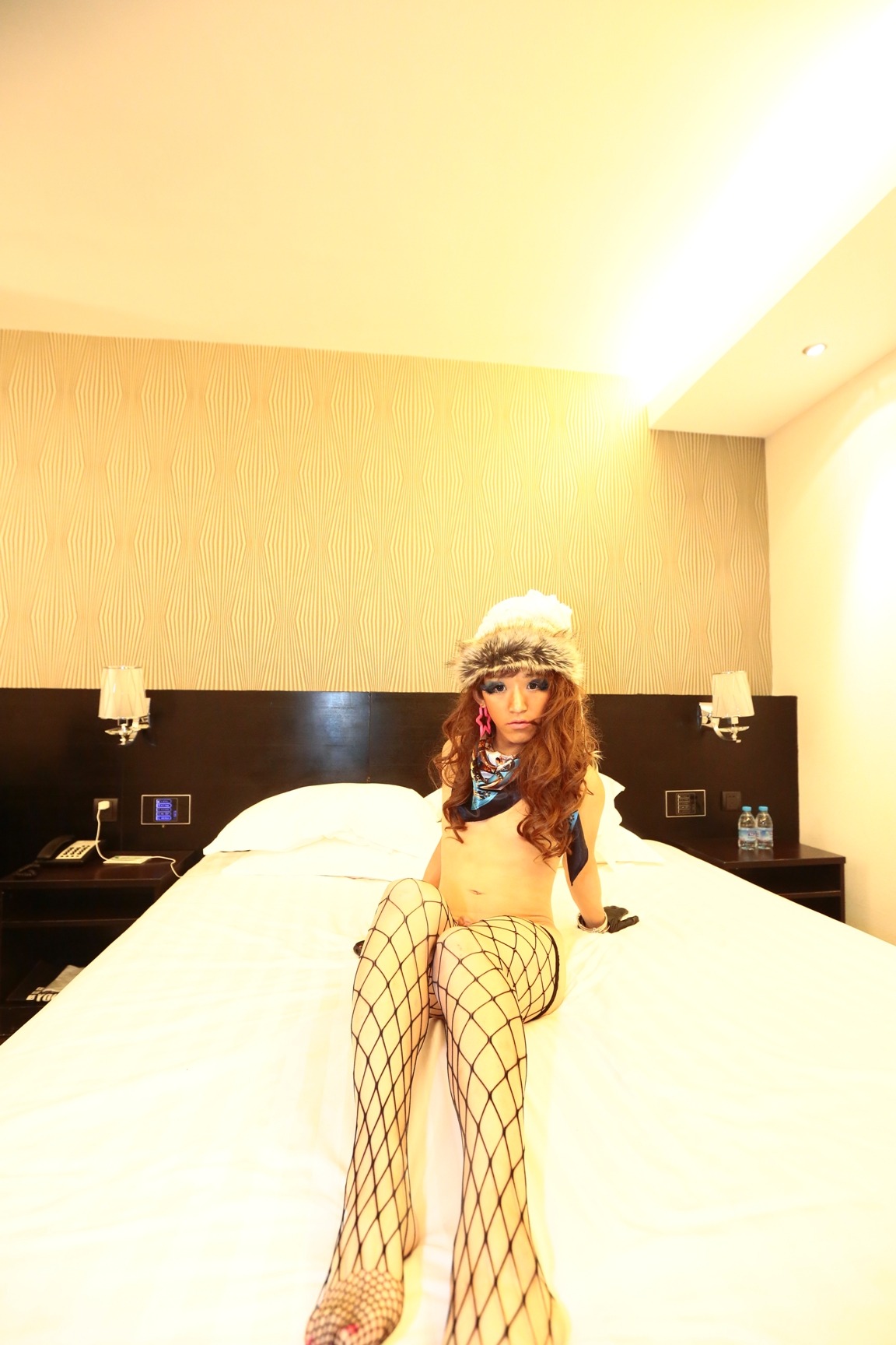 crossdresserchina-km:  Kostamaso in fishnet stockings and hyper high heel boots