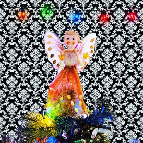 This is my mom’s favorite #ChristmasTreeTopper She an #antique #angel or #fairy ? What’s