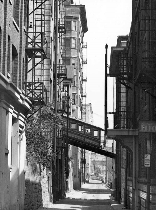 Angels Flight crossing over Clay Street, Los Angeles, 1960. Every building on either side of the street would meet the wrecking ball within a few short years.