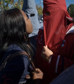 adignorantium:  theladylovessleepy:  trebled-negrita-princess:  highonmelanin:  manbear83:  fnhfal:  ku klux klan  Look at those cowards hiding their faces  black people be bold as fuck though  Cowards behind hoods don’t fucking scare us lmao  She should