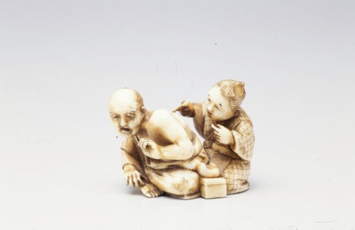 mia-japanese-korean: Netsuke [woman giving man a treatment], Unknown Japanese, late 19th century, Mi