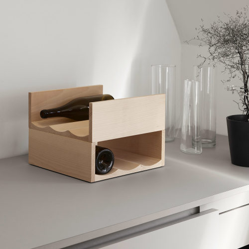 Bibita Bottle Rack by Max FrommeldThe London based Max Frommeld creates bespoke furniture and design