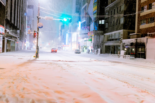 tokyo-fashion:  Super snowy Harajuku at 2am on Valentine’s Day night 2014. These are long exposure photos (using a tripod), so you can’t really see the snow falling, but it was snowing pretty hard! These shots are of Takeshita Dori, Harajuku Dori,